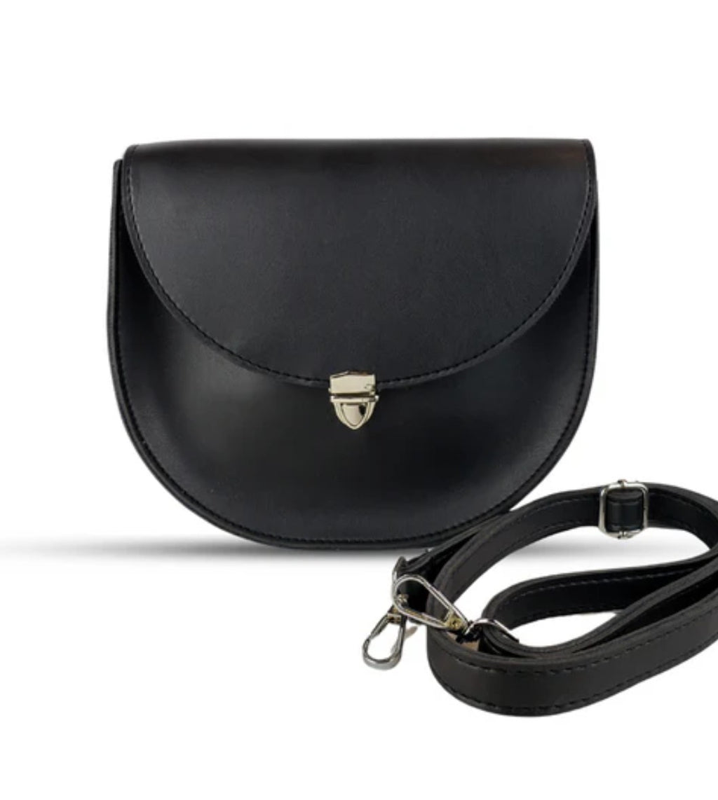 Black leather handbag with a strap 