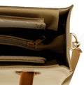 Beige handbag with brown handles and tassels