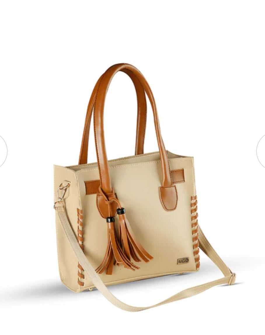 Beige handbag with brown handles and tassels